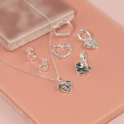 AMABEL SILVER HUGGIE EARRING