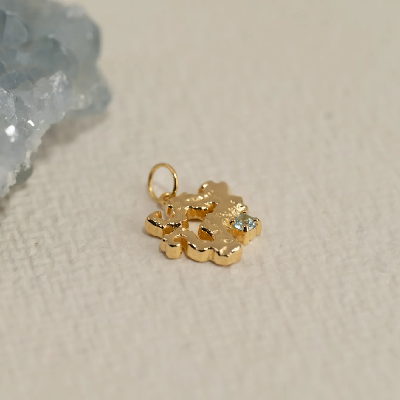 AURELIA BLUE TOPAZ GOLDEN PENDANT