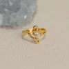 AURELIA BLUE TOPAZ GOLDEN RING
