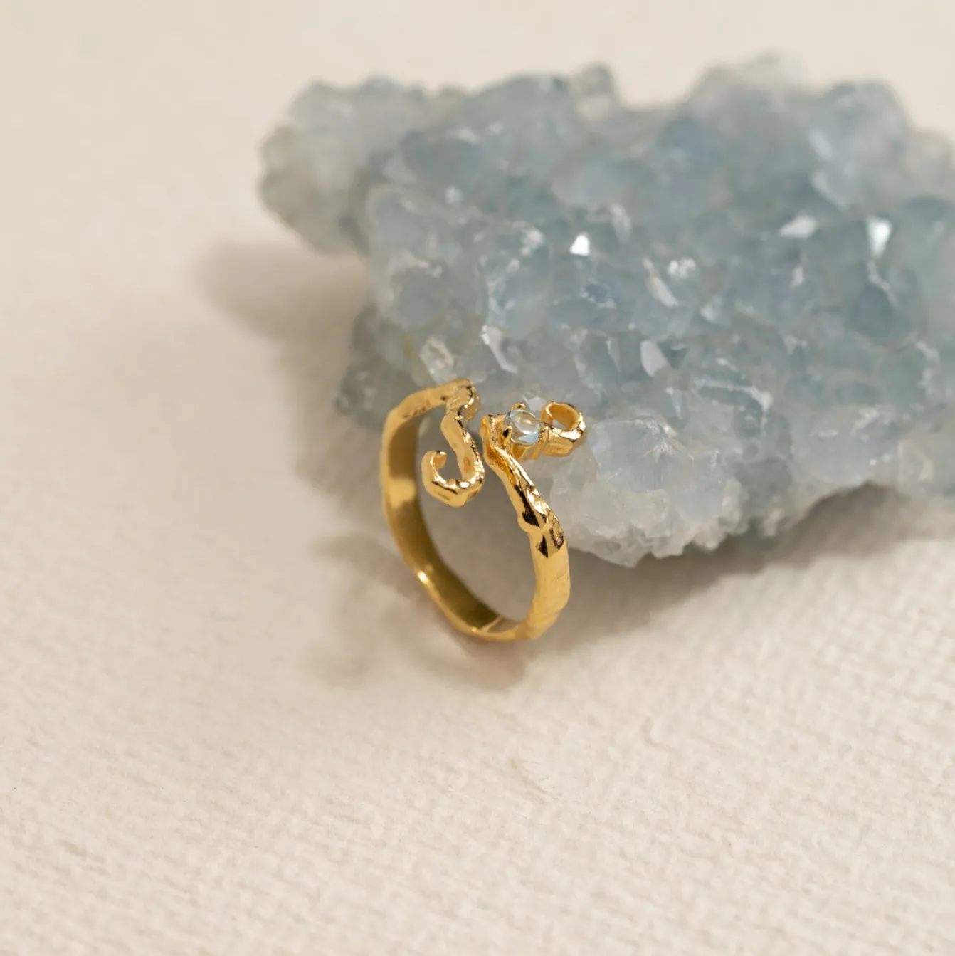 AURELIA BLUE TOPAZ GOLDEN RING