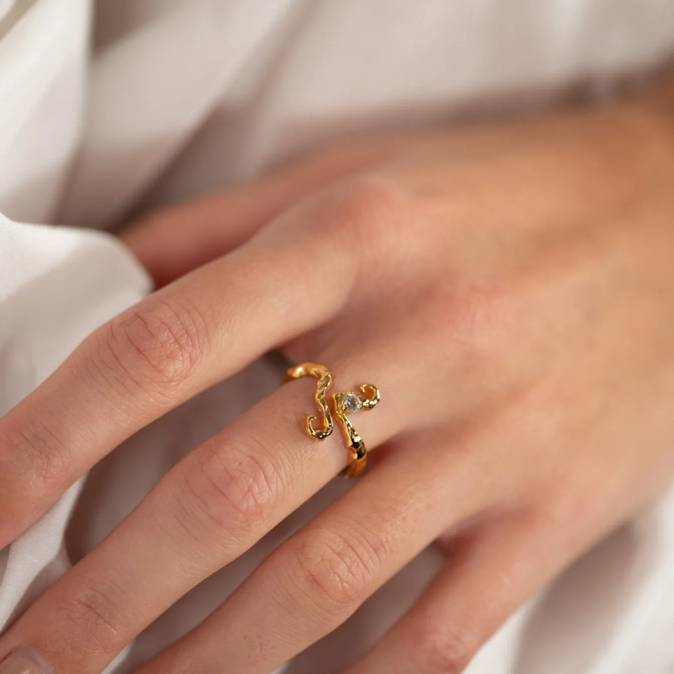 AURELIA BLUE TOPAZ GOLDEN RING