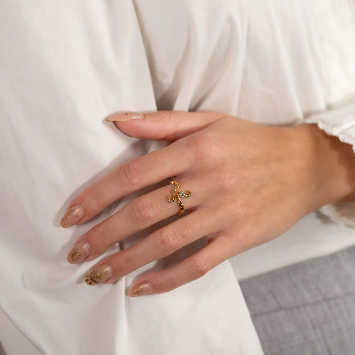 AURELIA BLUE TOPAZ GOLDEN RING