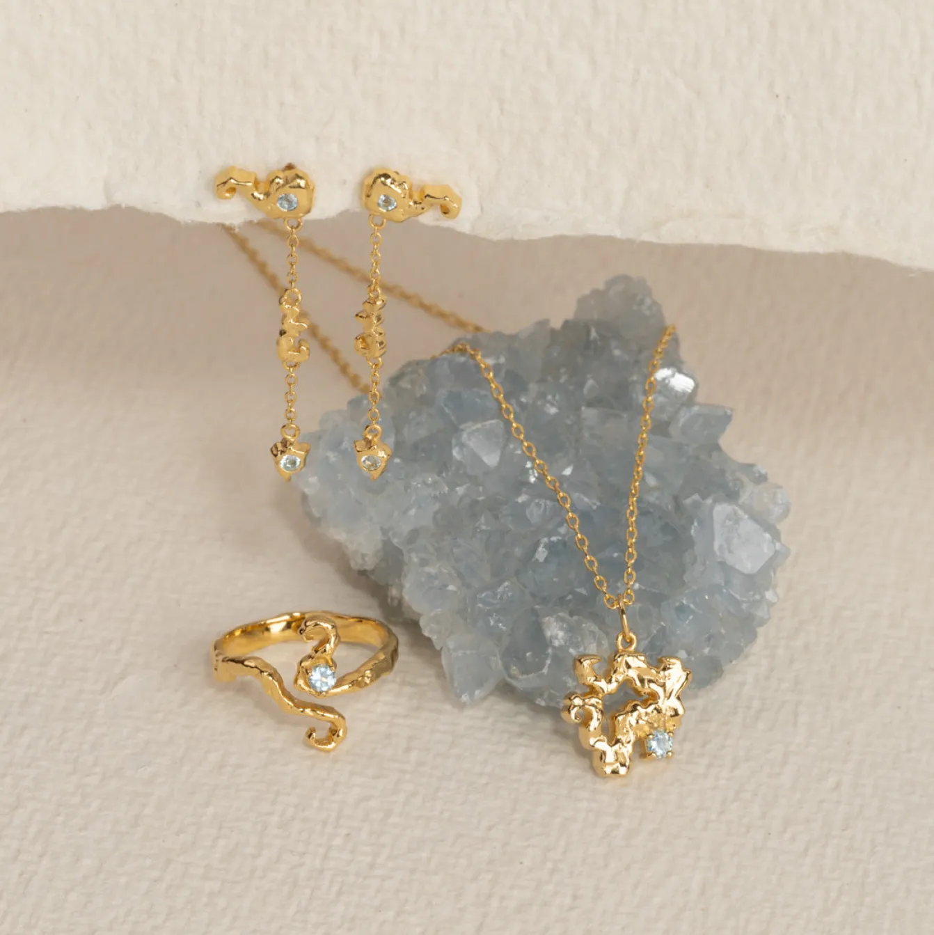 AURELIA BLUE TOPAZ GOLDEN PENDANT