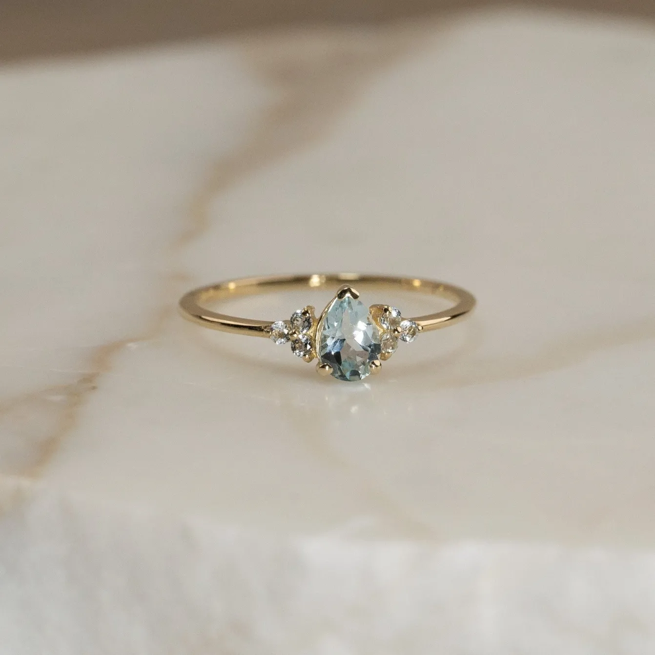 CASSANDRA BLUE TOPAZ SOLID GOLD RING