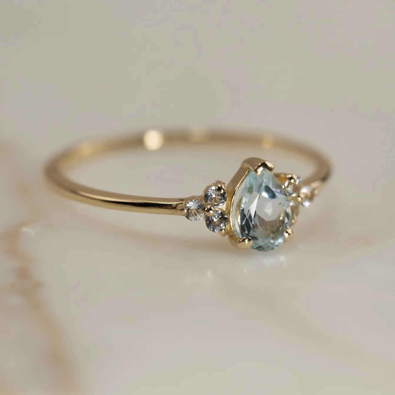 CASSANDRA BLUE TOPAZ SOLID GOLD RING