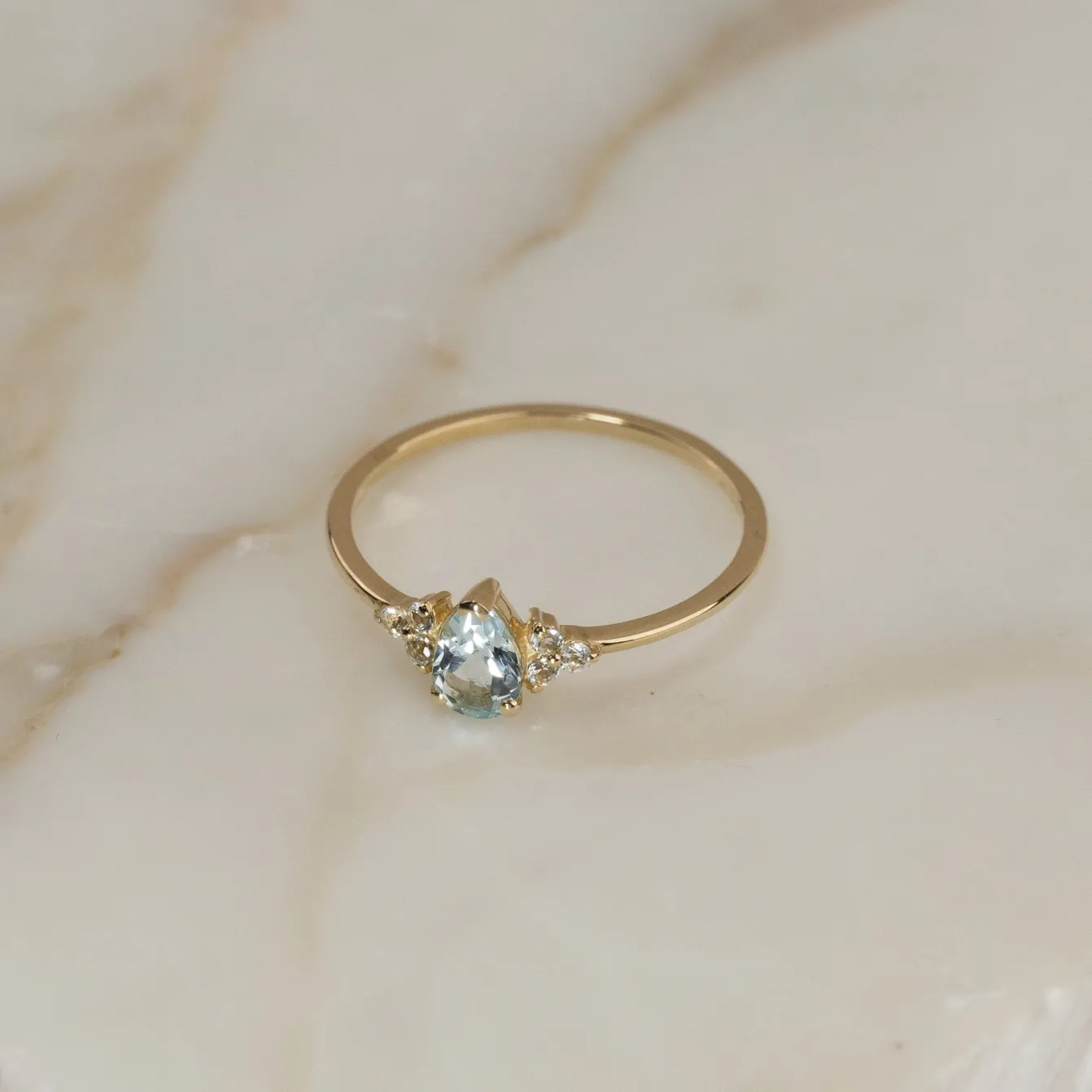 CASSANDRA BLUE TOPAZ SOLID GOLD RING