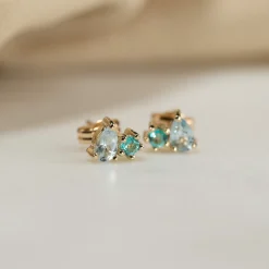 CLARIS BLUE TOPAZ SOLID GOLD STUD EARRING