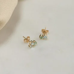 CLARIS BLUE TOPAZ SOLID GOLD STUD EARRING