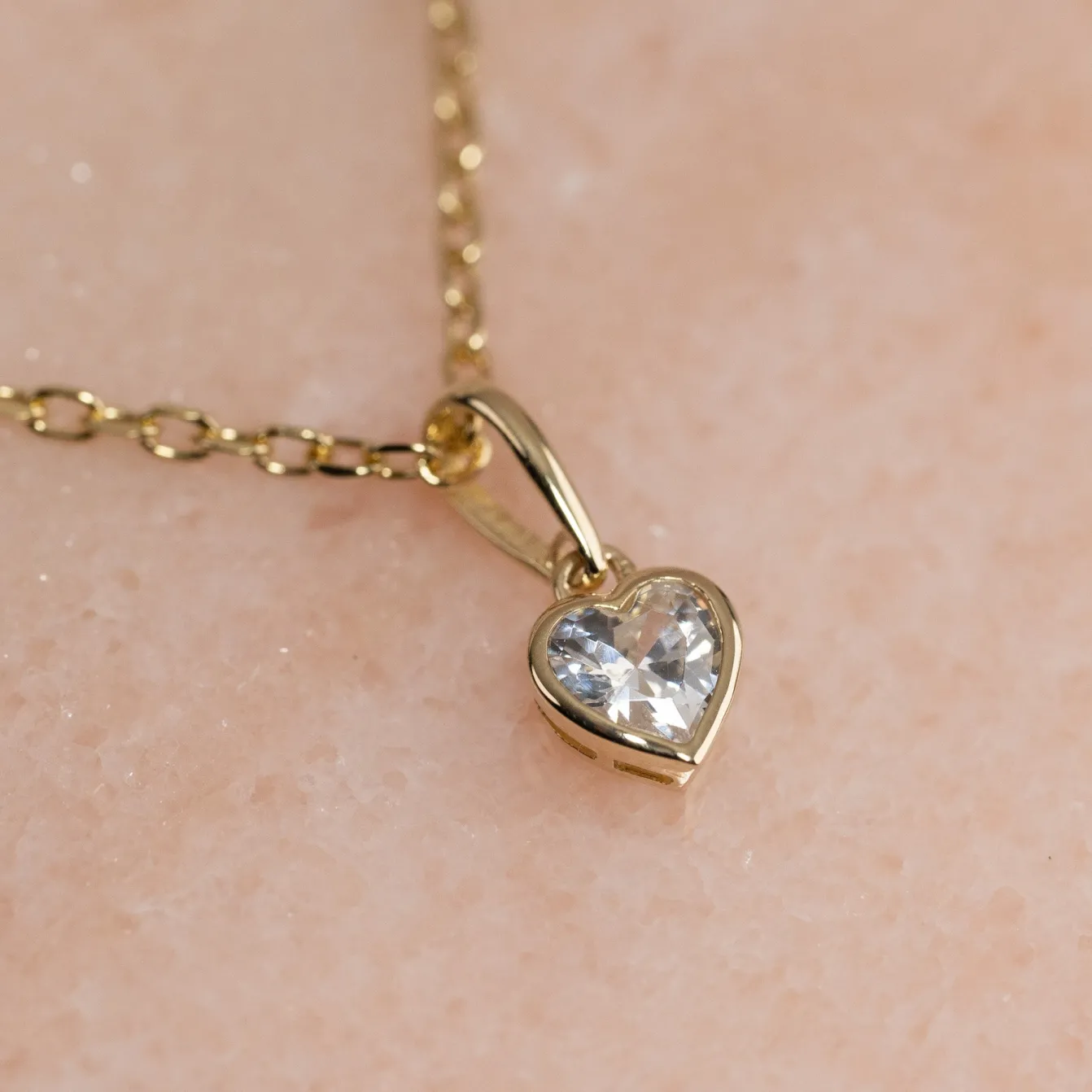 CRYSTAL HEART SOLID GOLD PENDANT