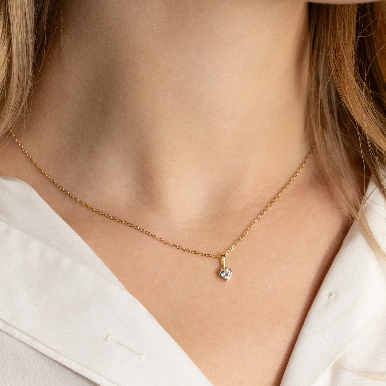 CRYSTAL HEART SOLID GOLD PENDANT