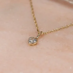 CRYSTAL HEART SOLID GOLD PENDANT