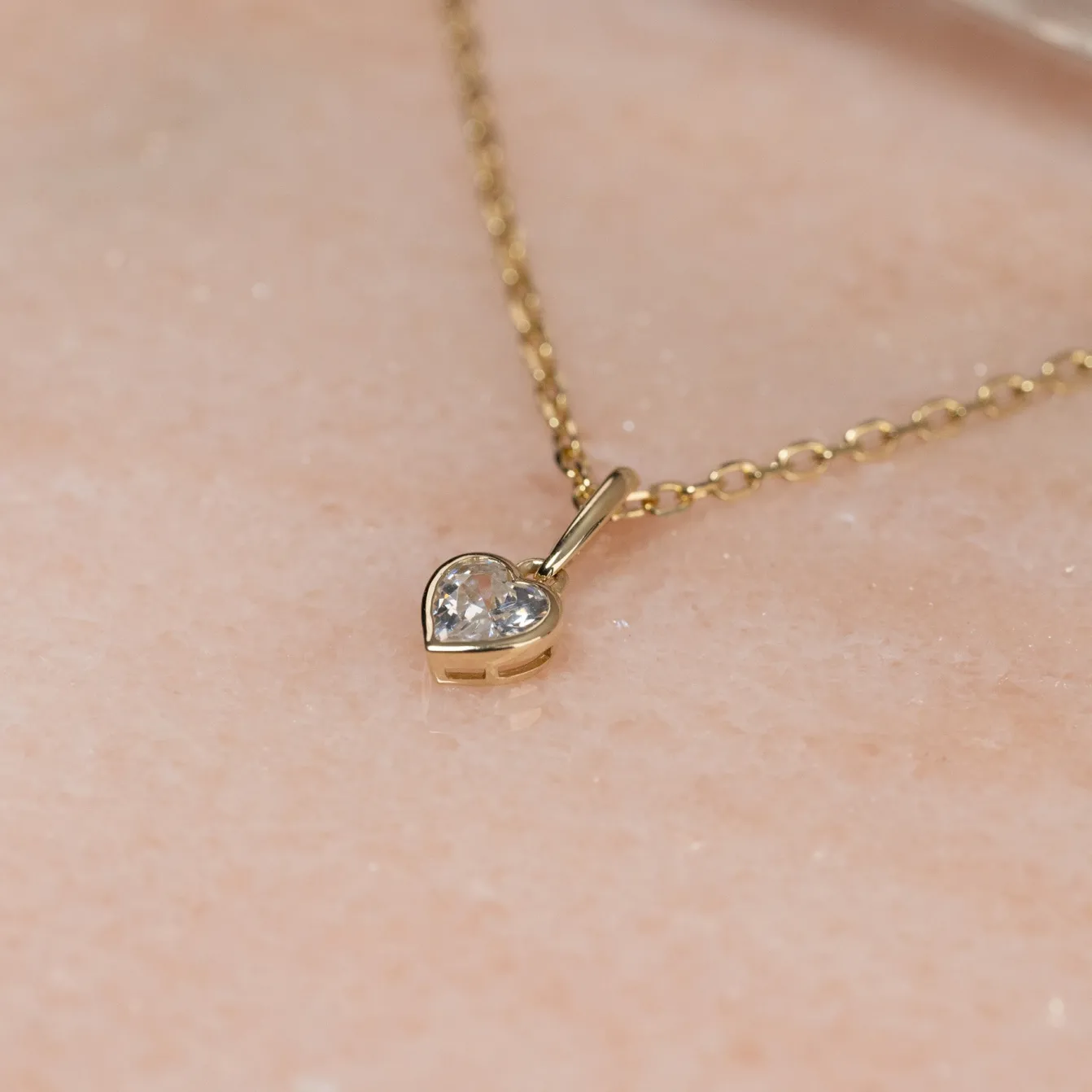 CRYSTAL HEART SOLID GOLD PENDANT