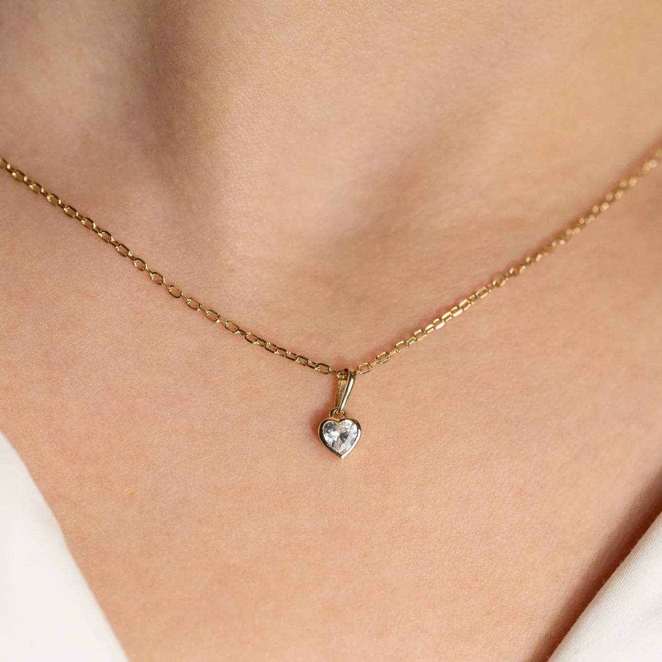 CRYSTAL HEART SOLID GOLD PENDANT