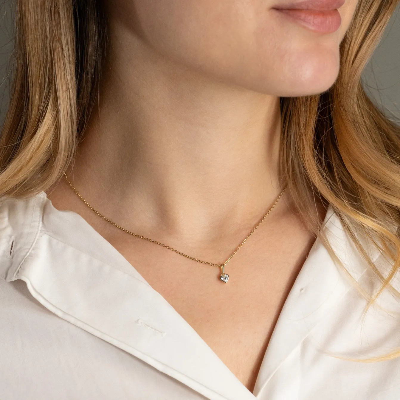 CRYSTAL HEART SOLID GOLD PENDANT