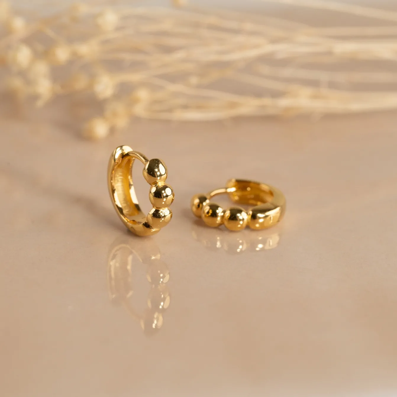 DICTE SMALL GOLDEN CREOL EARRING