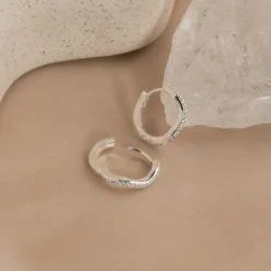 GAIA CRYSTAL SILVER HUGGIE EARRING