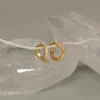 GALIA CRYSTAL SMALL GOLDEN HUGGIE EARRING