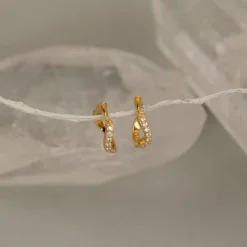 GALIA CRYSTAL SMALL GOLDEN HUGGIE EARRING
