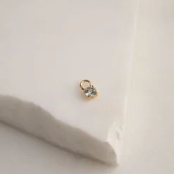 GEMMA BLUE TOPAZ GOLDEN EARRING CHARM - Sisi Copenhagen
