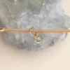 GEMMA BLUE TOPAZ GOLDEN PENDANT - Sisi Copenhagen