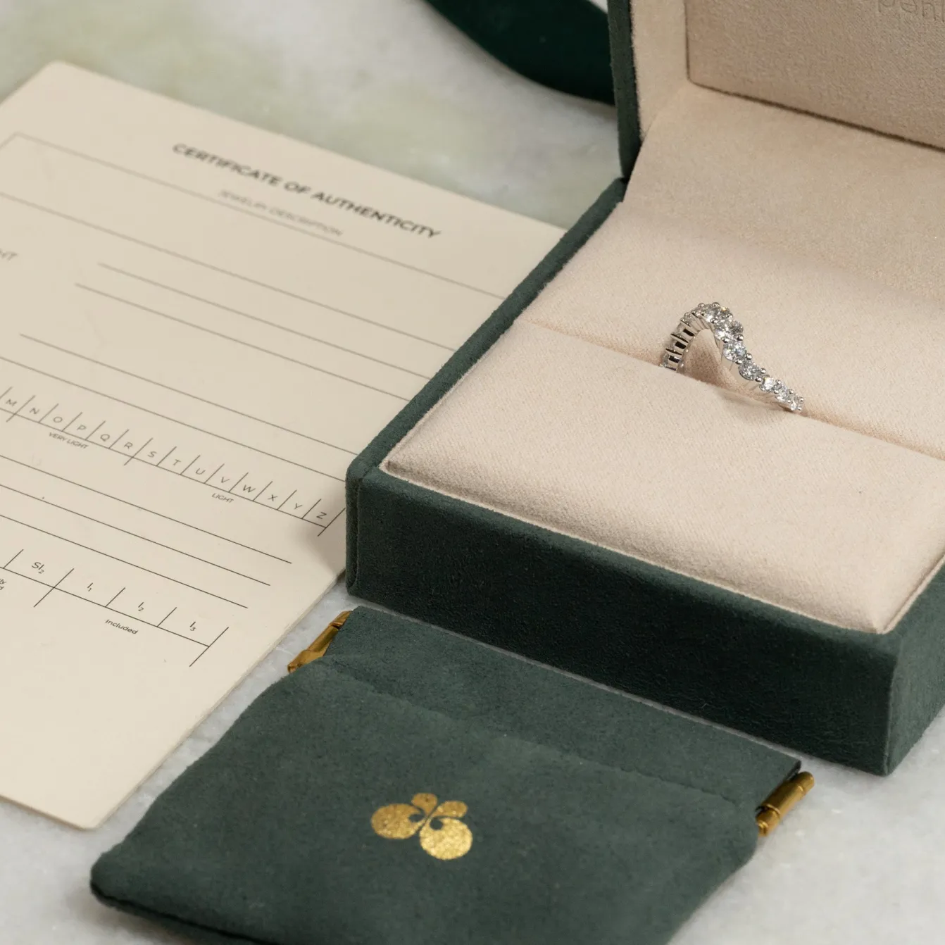 GRADUATING CURVED DIAMOND RING - 1.2ct - WG