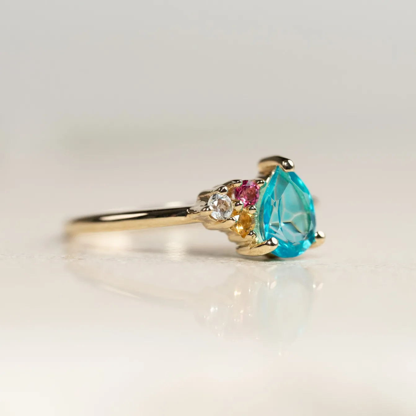 GYDA PARAIBA TOPAZ SOLID GOLD RING