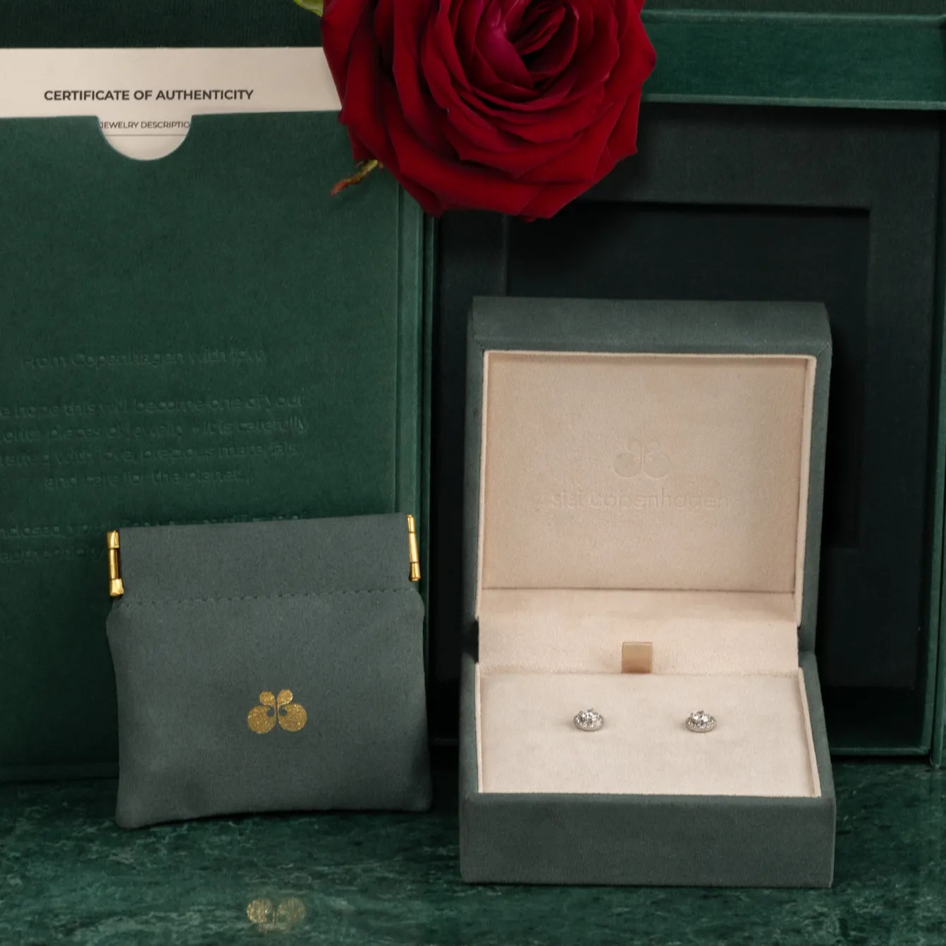 HALO DIAMOND STUD EARRING - 0.65ct - WG