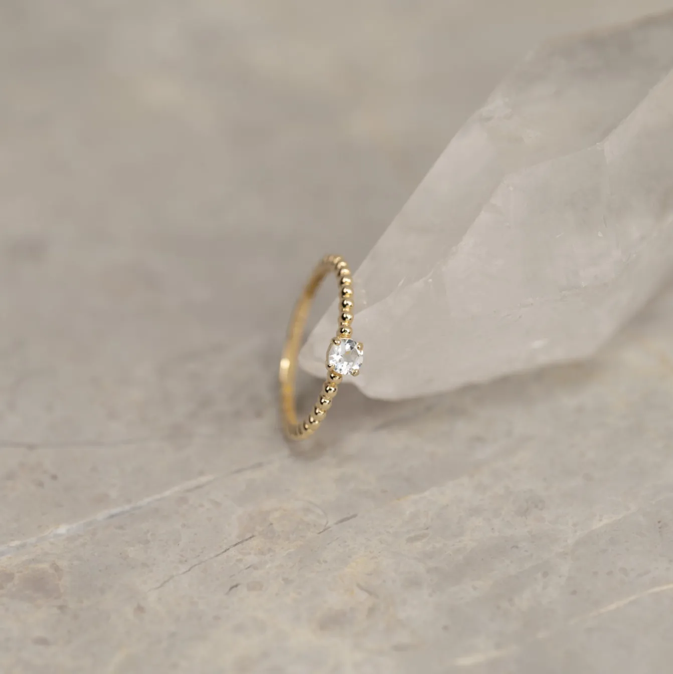 INGRID CRYSTAL SOLID GOLD RING