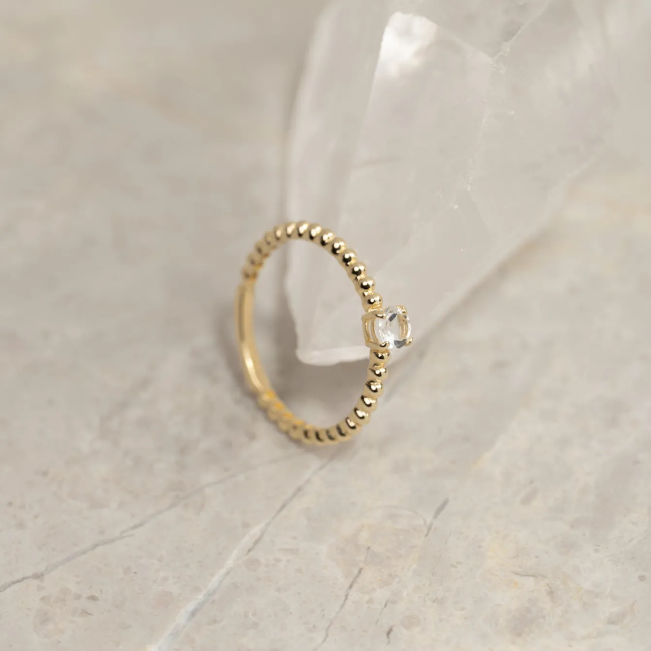 INGRID CRYSTAL SOLID GOLD RING