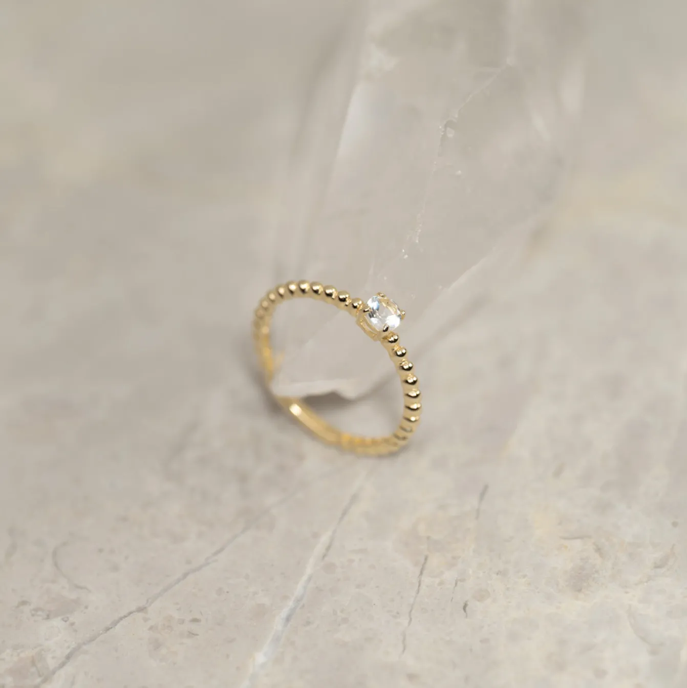 INGRID CRYSTAL SOLID GOLD RING