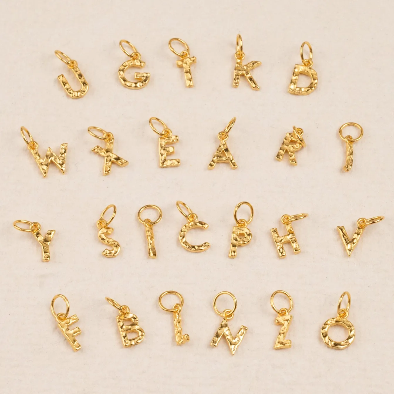 LETTER MOLTEN GOLDEN PENDANT