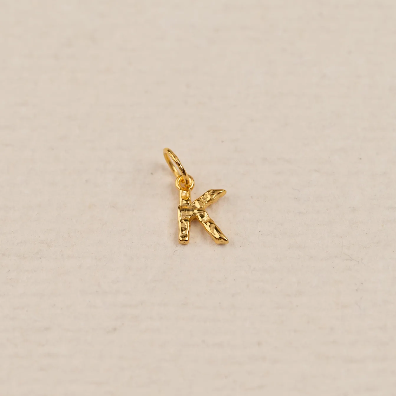 LETTER MOLTEN GOLDEN PENDANT