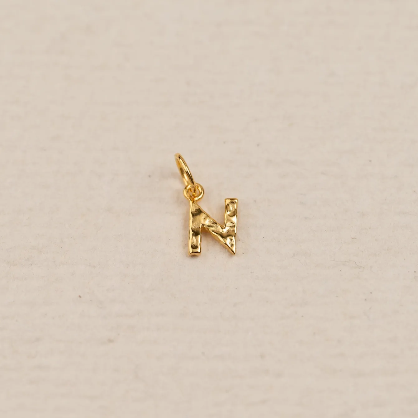 LETTER MOLTEN GOLDEN PENDANT