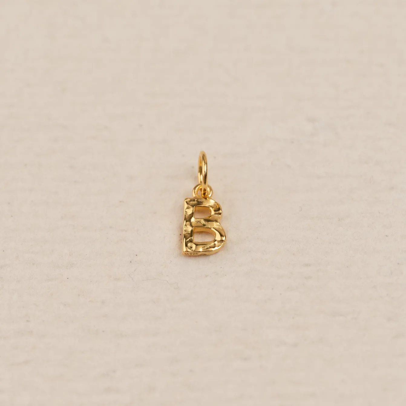 LETTER MOLTEN GOLDEN PENDANT