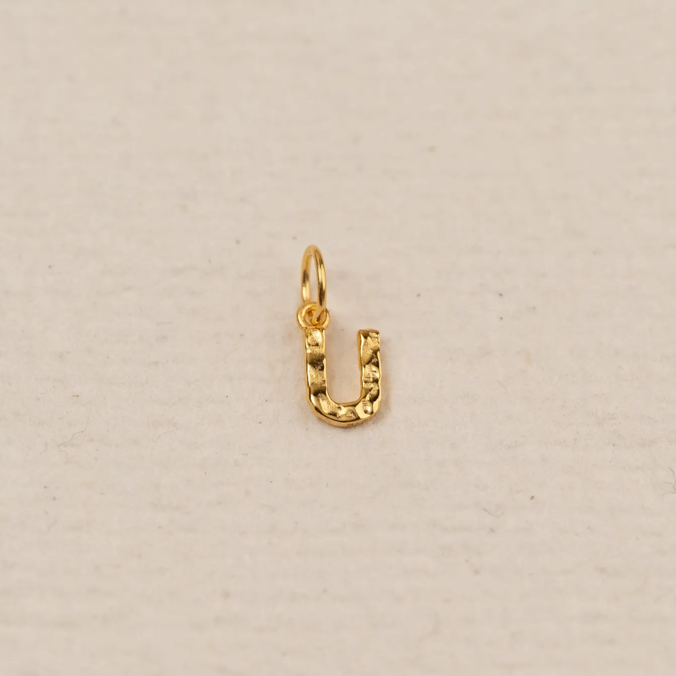 LETTER MOLTEN GOLDEN PENDANT