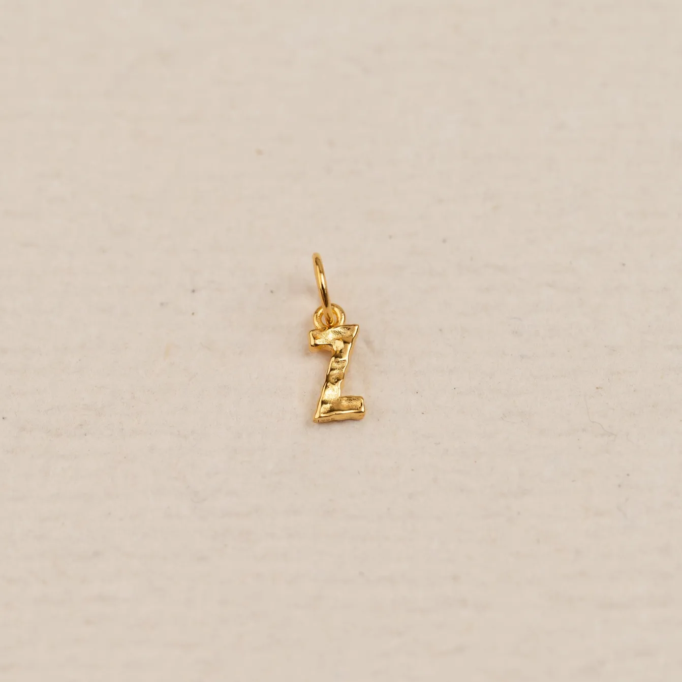 LETTER MOLTEN GOLDEN PENDANT