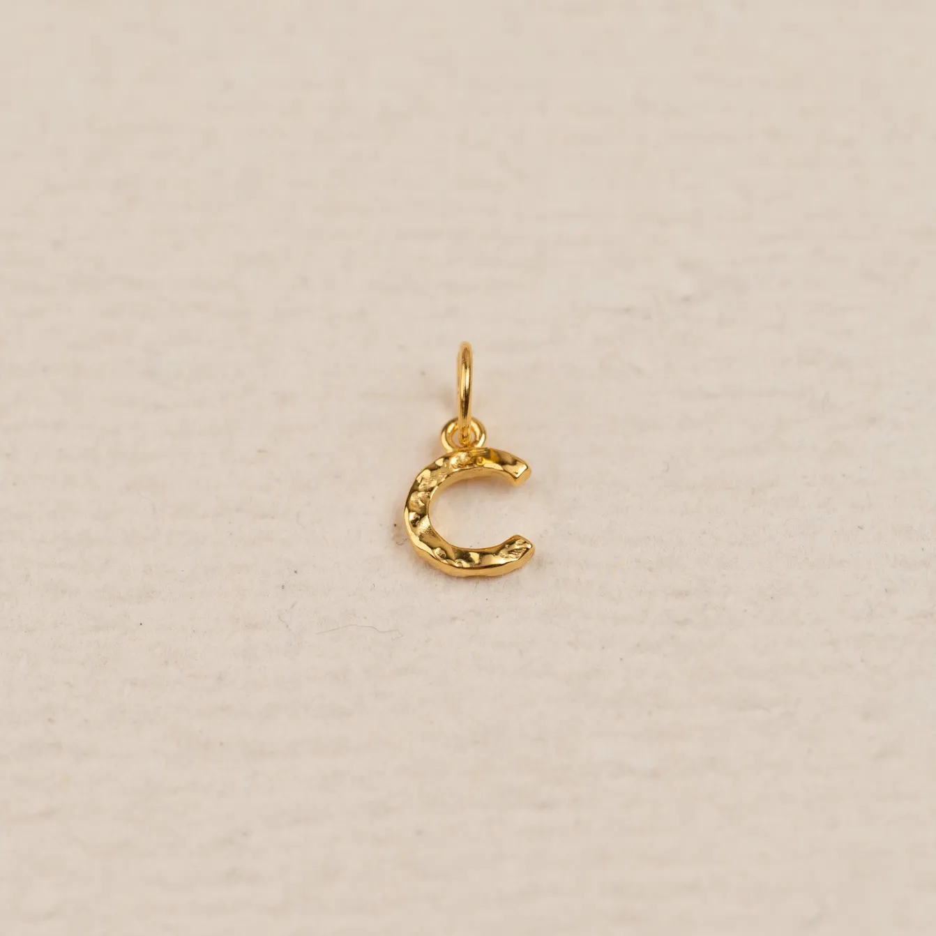 LETTER MOLTEN GOLDEN PENDANT