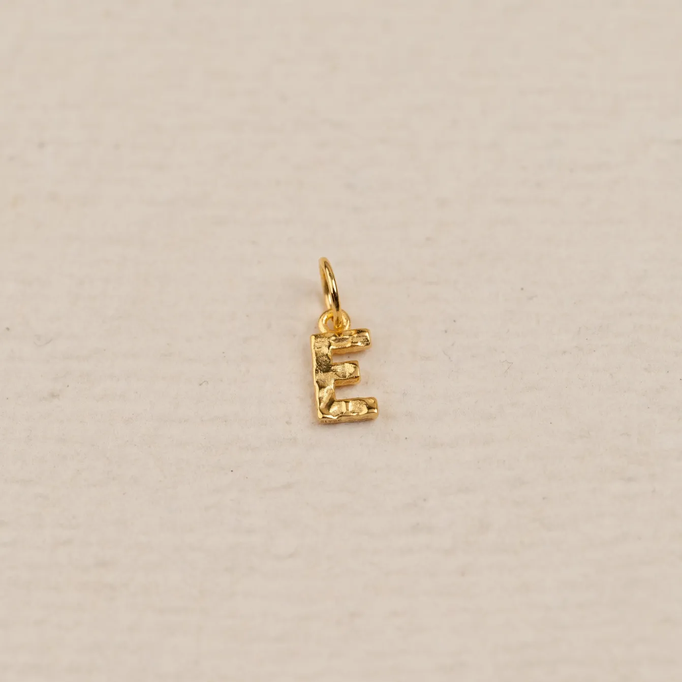 LETTER MOLTEN GOLDEN PENDANT