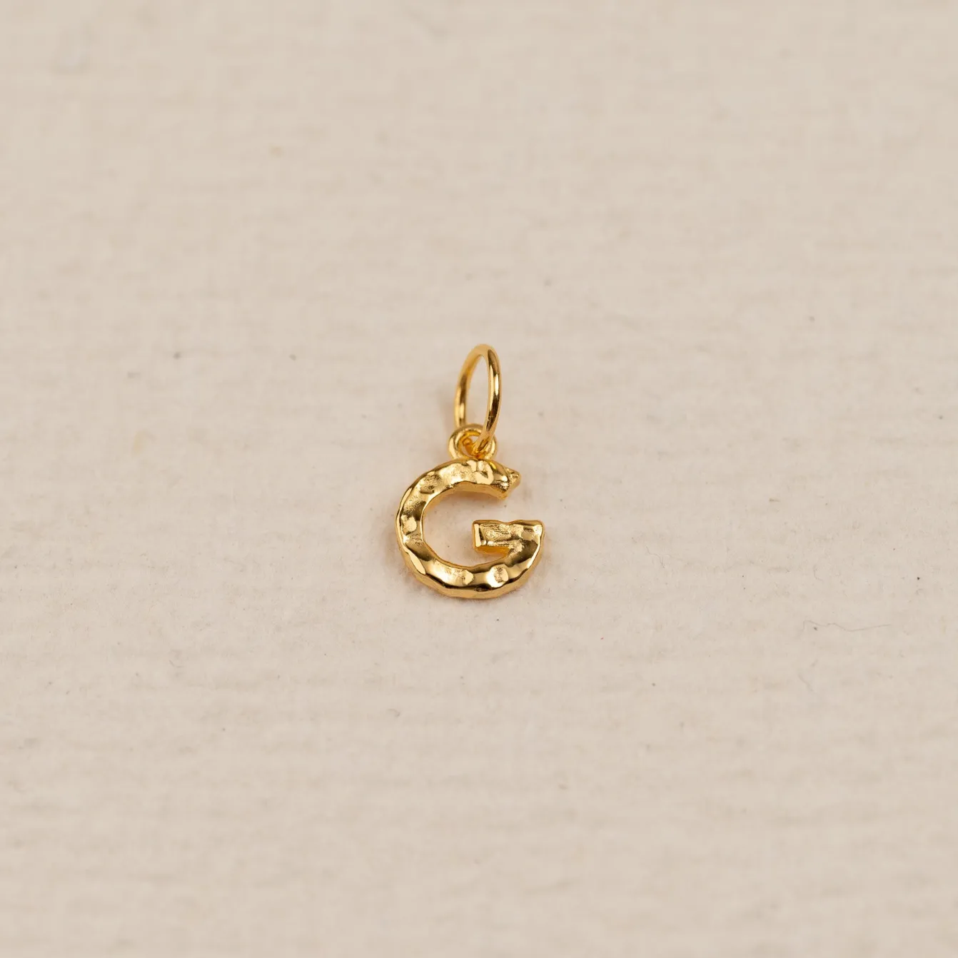 LETTER MOLTEN GOLDEN PENDANT