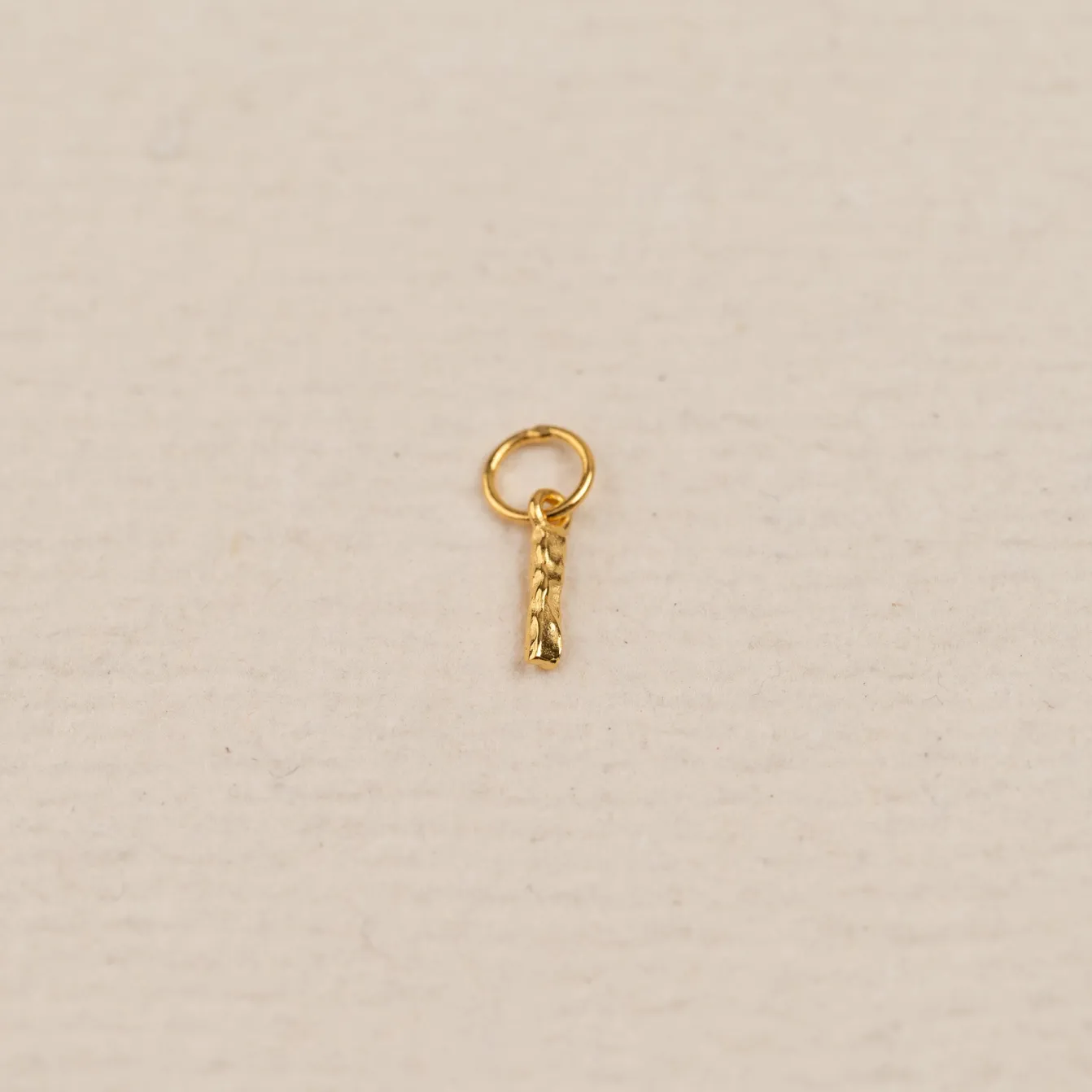 LETTER MOLTEN GOLDEN PENDANT