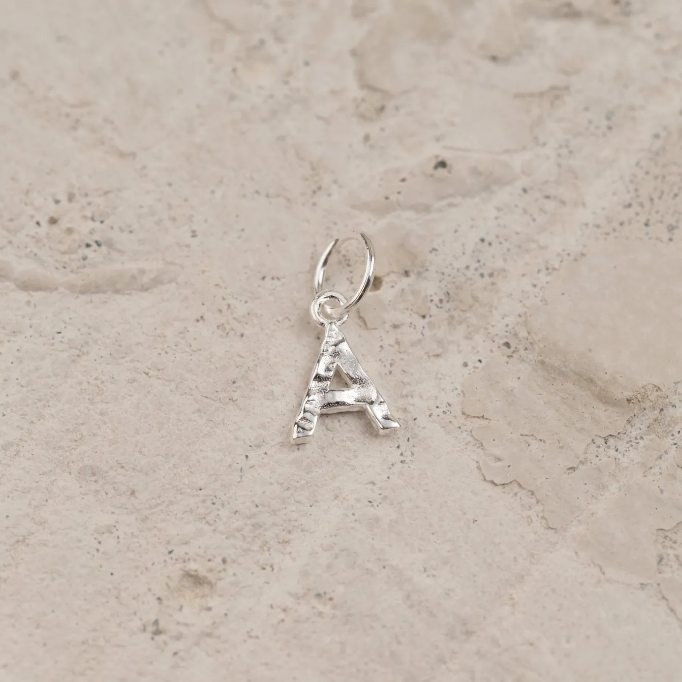 LETTER MOLTEN SILVER PENDANT