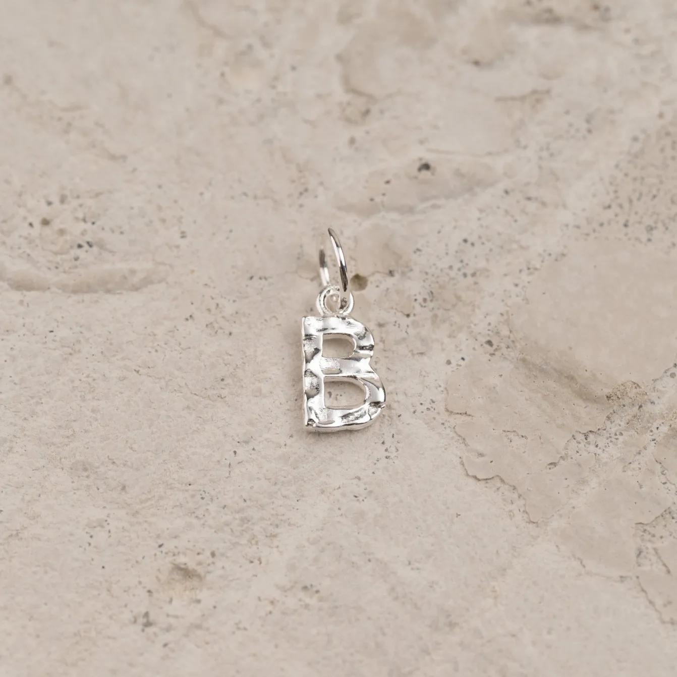 LETTER MOLTEN SILVER PENDANT