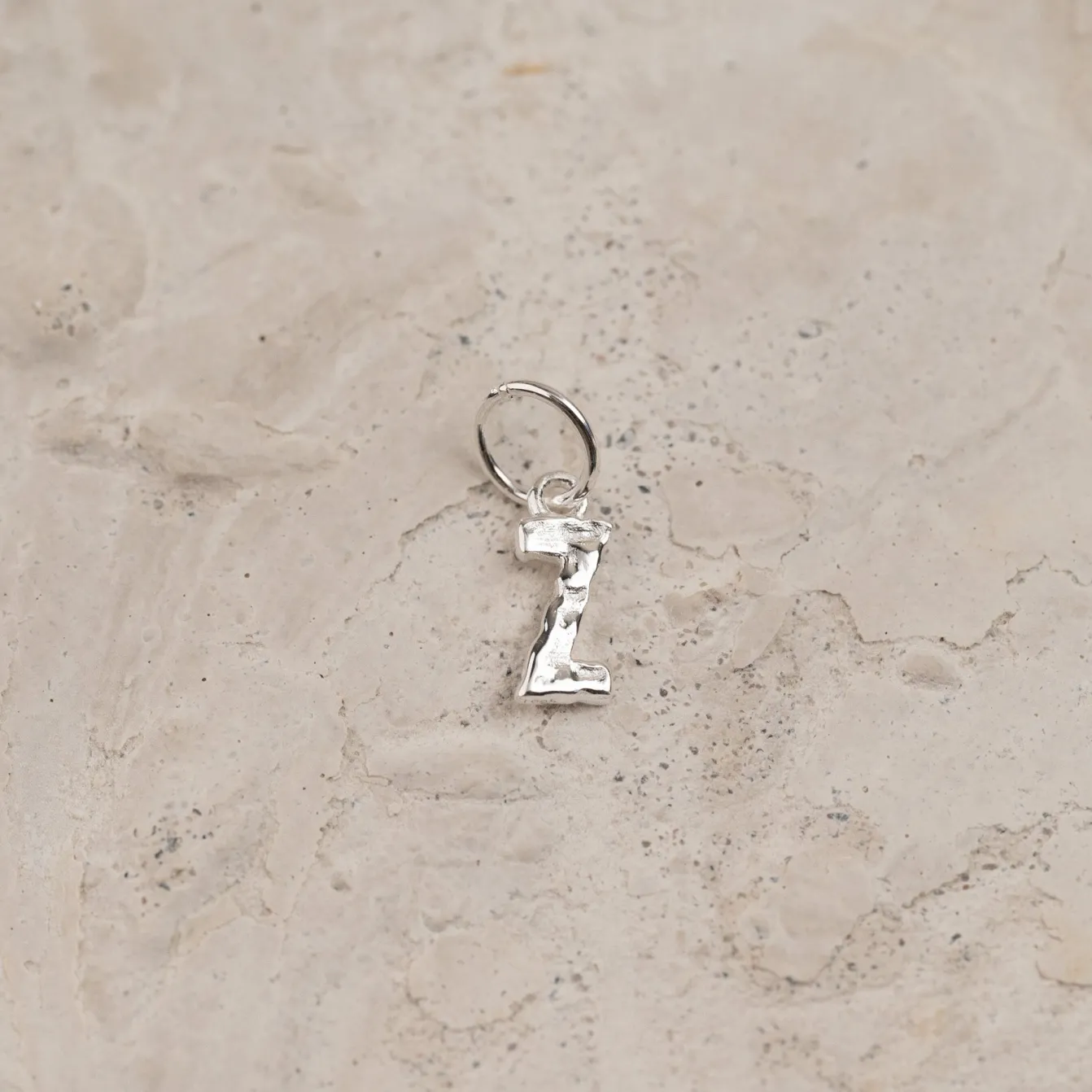 LETTER MOLTEN SILVER PENDANT