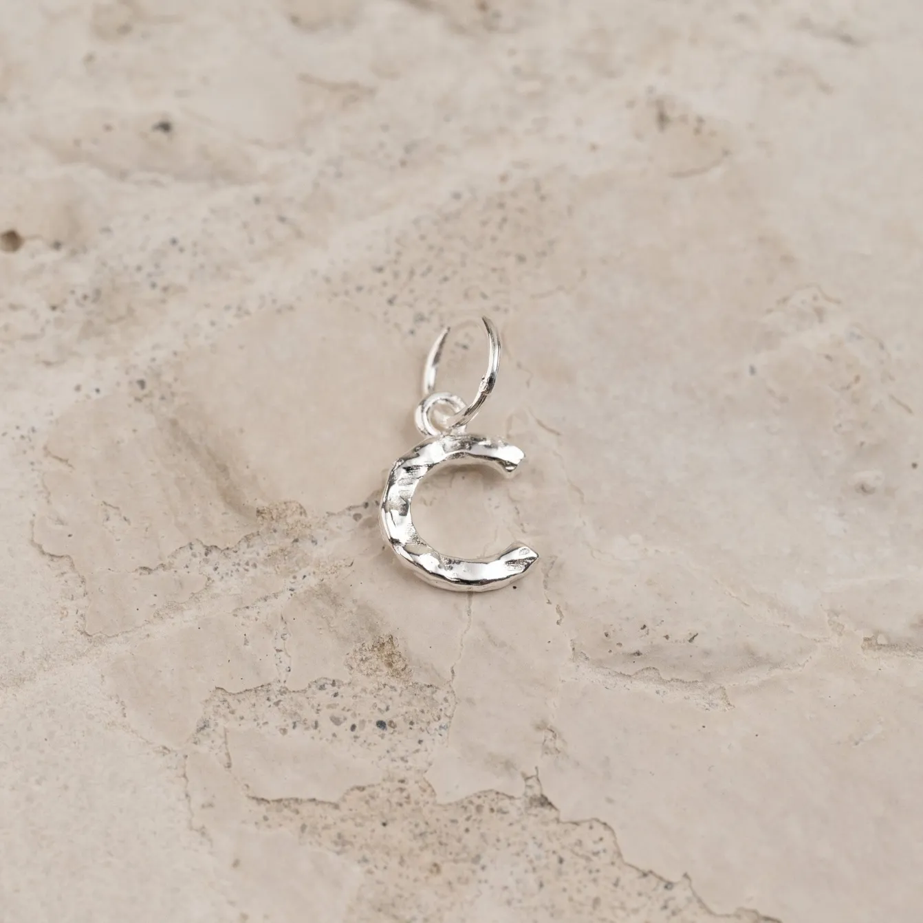 LETTER MOLTEN SILVER PENDANT