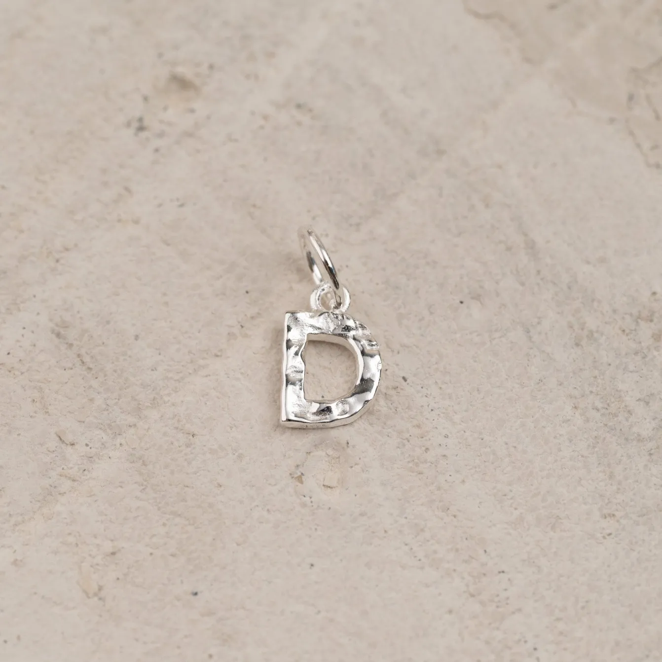 LETTER MOLTEN SILVER PENDANT