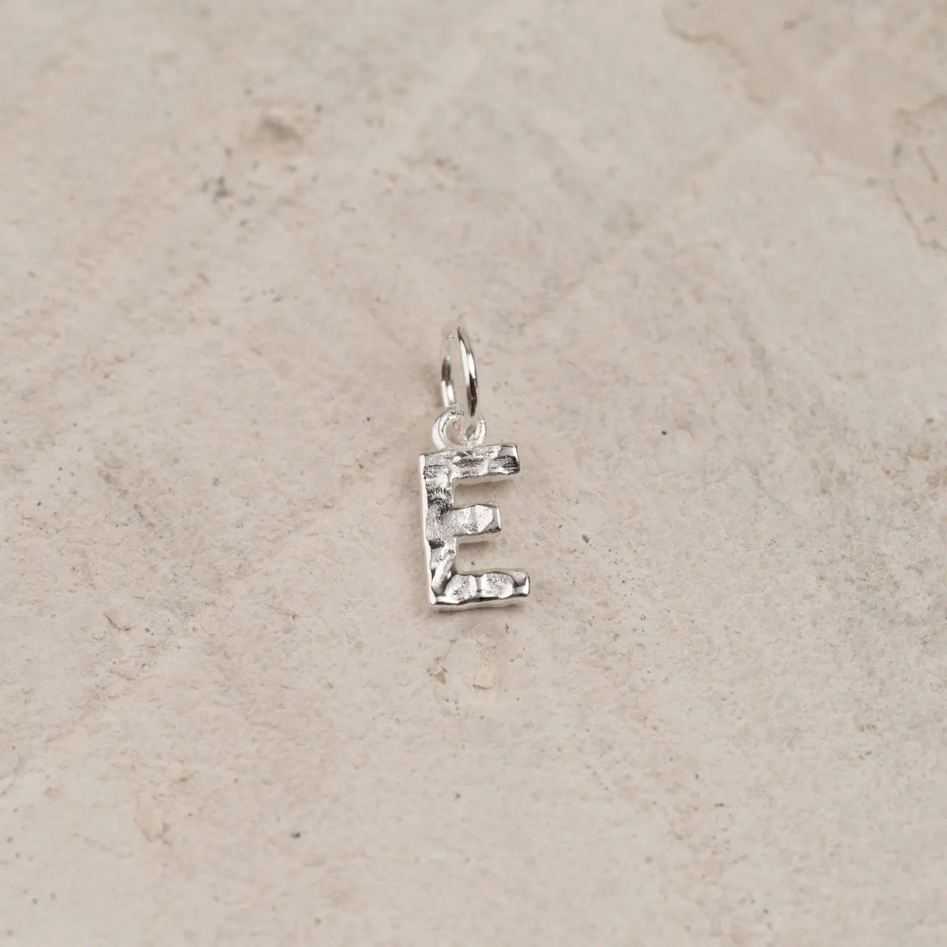 LETTER MOLTEN SILVER PENDANT