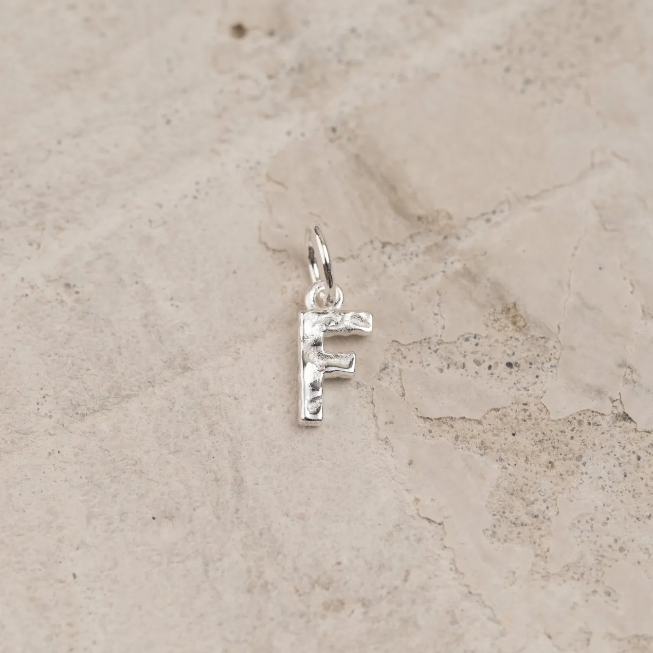 LETTER MOLTEN SILVER PENDANT