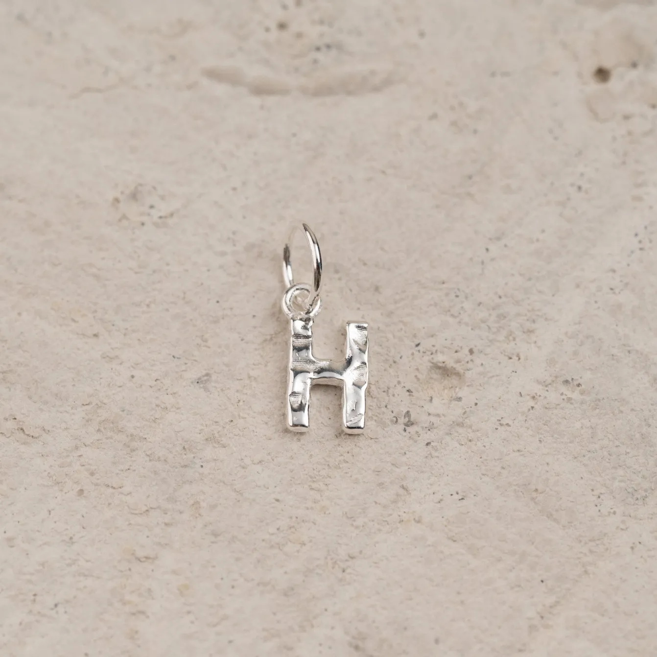 LETTER MOLTEN SILVER PENDANT