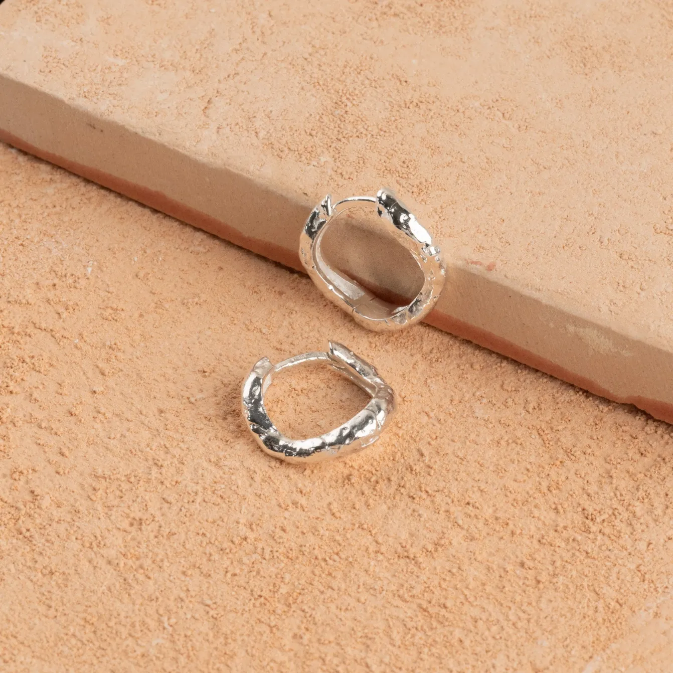 MAIA SILVER HUGGIE EARRING