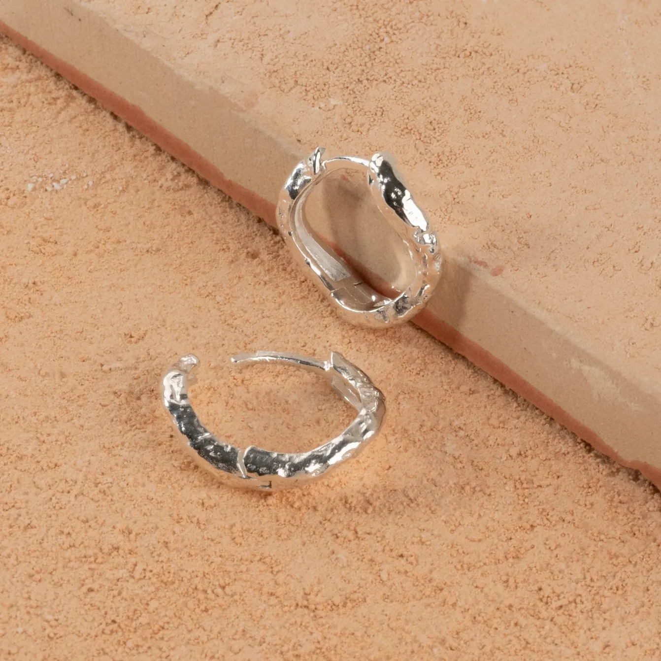 MAIA SILVER HUGGIE EARRING